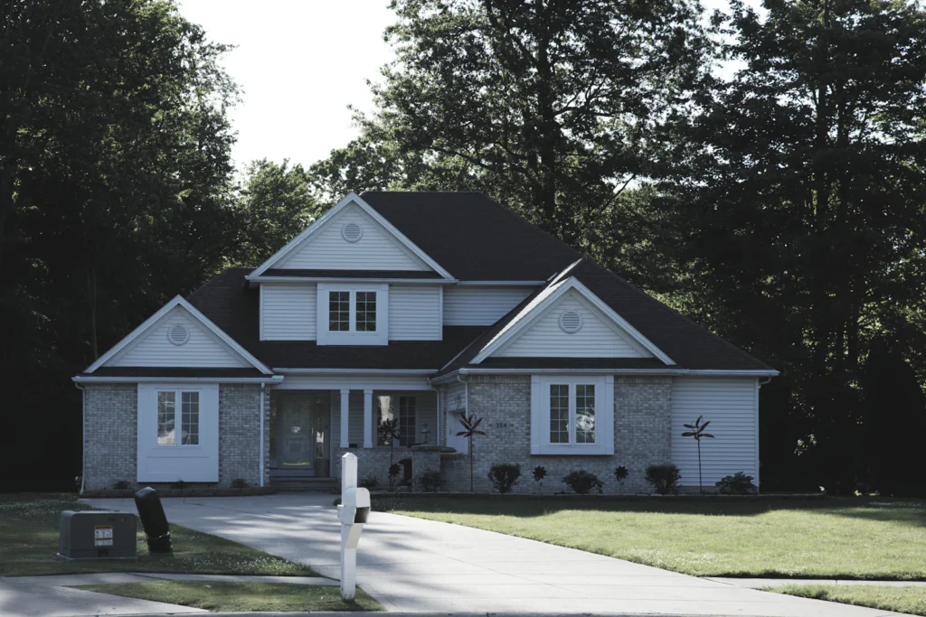 Residential home with new siding and white trim