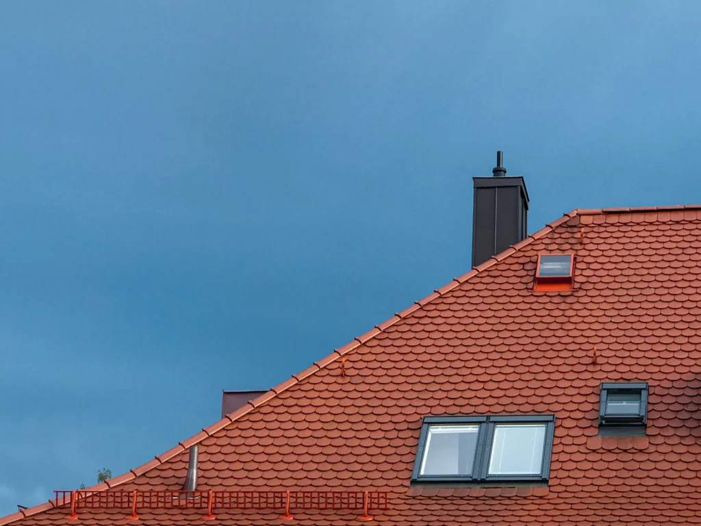 Skylight installed in a shingle roof